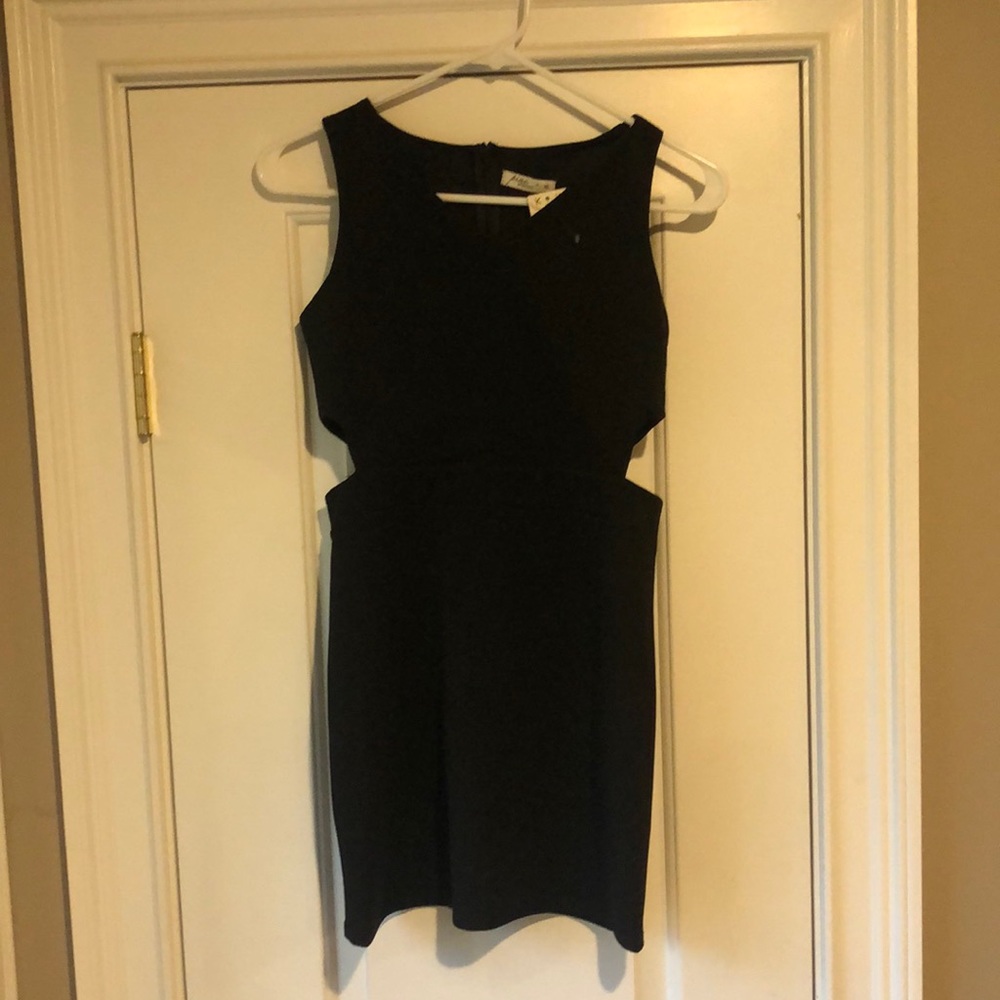 Black Pinc brand mini dress with side slits.